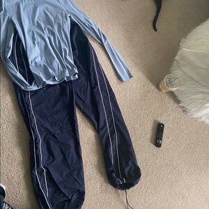 Light Blue Long Sleeve Athletic Top with Navy Blue Drawstring Sweatpants